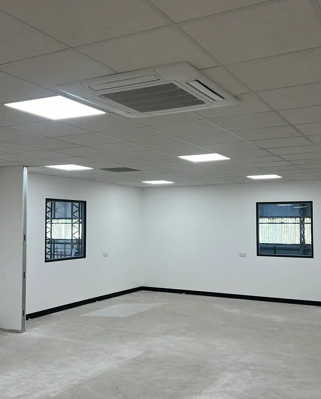 Ceiling cassette air conditioning in a newly fitted office