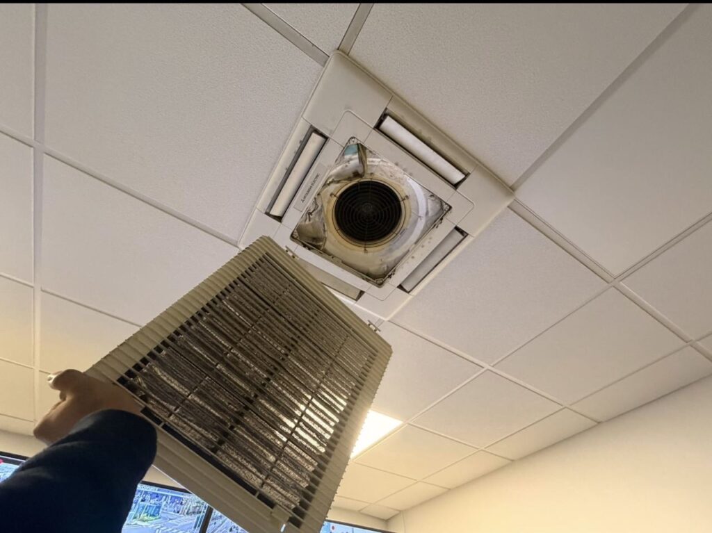 Ceiling cassette grille and filter removed for cleaning